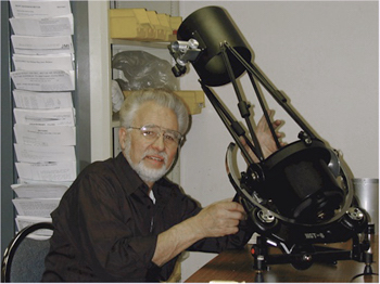 Jim Burr with engineering model of the NGT telescope (70,983 bytes).